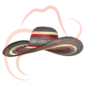 Vista tres cuartos del sombrero vueltiao de 23 vueltas con colores predominantes en rojo, blanco y negro. Tejido de caña flecha con diseño artesanal detallado.